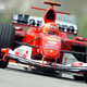 A photo of Michael Schumacher driving a 2004 Ferrari F1 car.